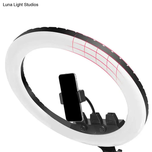 Minimalist black and white led ring light with phone mount and red grid lines featuring adjustable color temperature