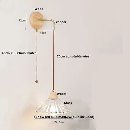 Minimalist brass wall light with clear glass fluted pendant and wooden accents for bedroom decorbites clear glass design