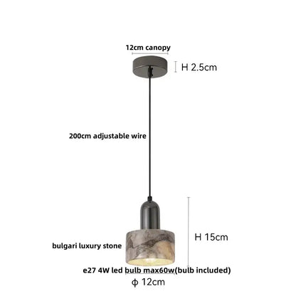 A minimalist pendant light with a black canopy, adjustable wire, and Bulgari stone shade for dining room decorbites copper yellow