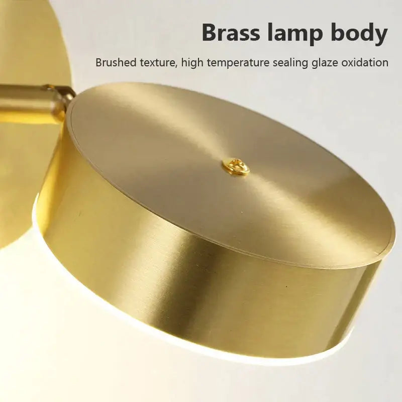 Minimalist brass wall lamp with brushed texture and warm golden finish for decorbites iron wall lamp bedroom sconce