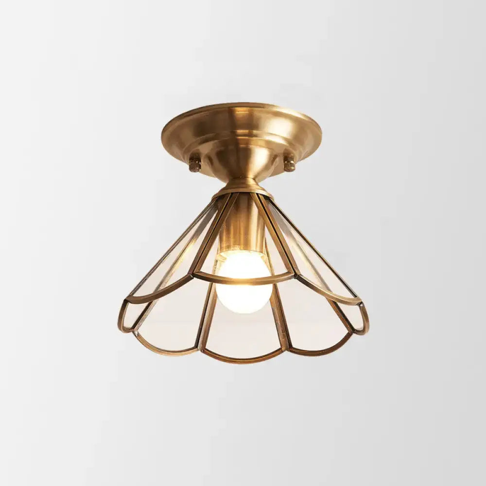 Decorbites minimalist brass flush mount with antique brass finish and petal-shaped glass shade single bulb flush lighting