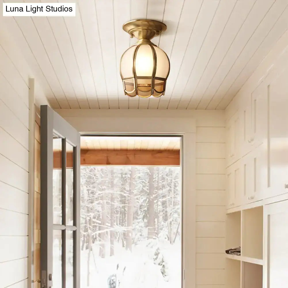 Decorbites minimalist brass flush mount ceiling light with frosted glass globe and scalloped metal single bulb flush design
