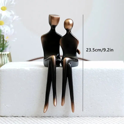 Minimalist bronze and black resin couple sculptures with sleek abstract design for elegant resin decorbites bedroom decor