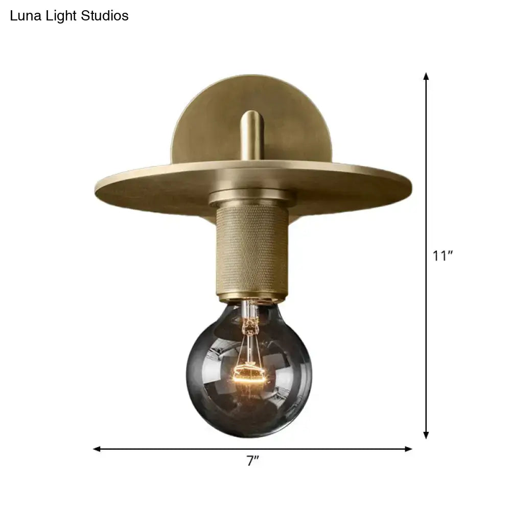 Decorbites™ minimalist bronze wall sconce with brass finish textured stem and dark amber glass shade light bulb