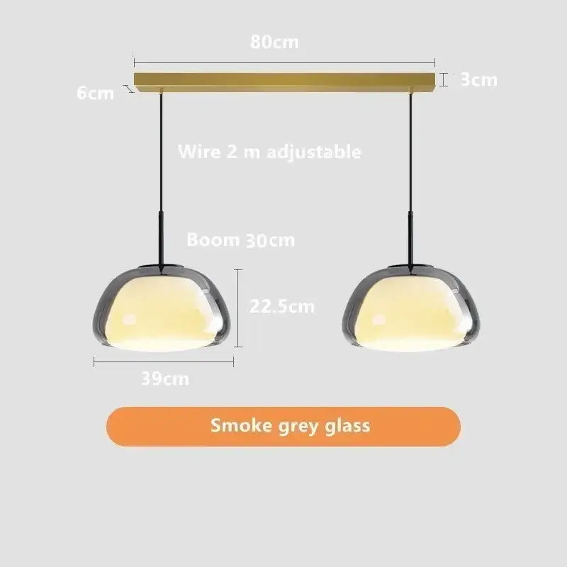 Modern double jelly pendant lamp with smoke grey glass shades and brass-finished bar for living room lighting