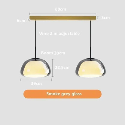 Modern double jelly pendant lamp with smoke grey glass shades and brass-finished bar for living room lighting