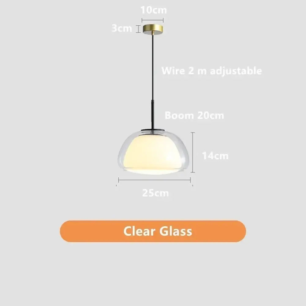 Minimalist clear glass jelly pendant lamp with brass finish and black wire suspension for living room lighting