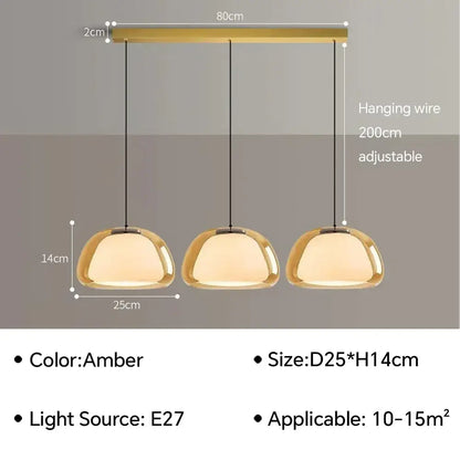 Set of three amber glass jelly pendant lamps with a modern minimalist design for living room lighting