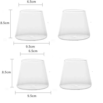 Minimalist clear glass water cup with tapered conical shape and smooth transparent surfaces for kitchen and dining room