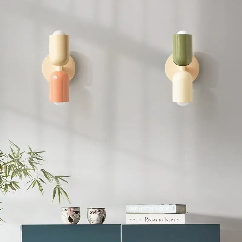 Minimalist cream double head wall lamps with pastel peach and olive green shades on beige backplates for bedroom decorbites cream double