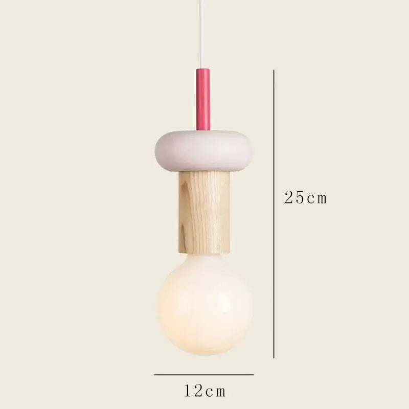 Minimalist earth tone pendant light with matte white ceramic top, natural wood middle, and pink connector for dining room decorbites colorful nordic wood