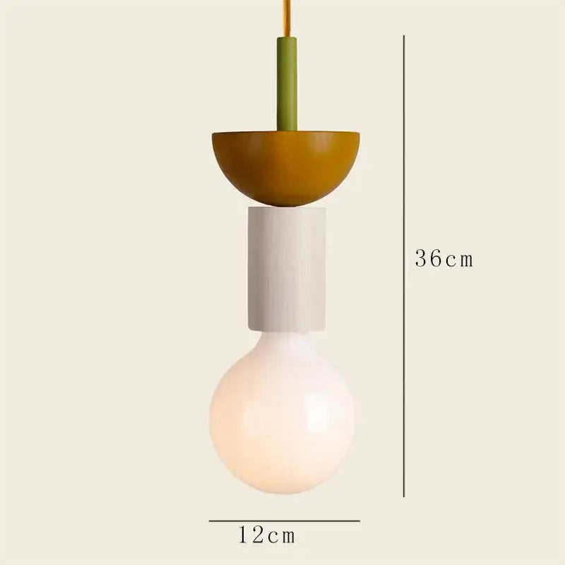Minimalist earth tone pendant light with matte mustard-yellow top, white ceramic middle, and frosted glass bulb by decorbites colorful nordic wood