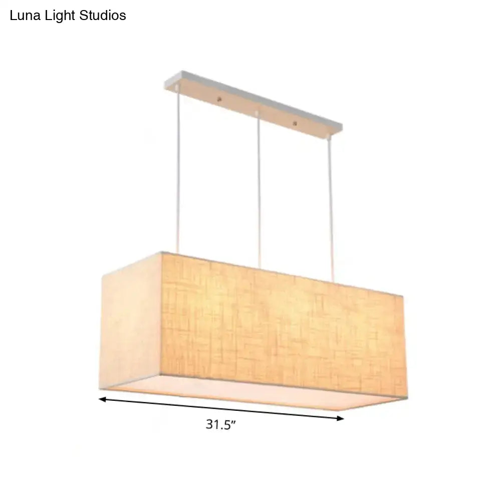 Minimalist flaxen rectangle island lighting with warm beige fabric shade and silver metal ceiling mount island lighting fixture
