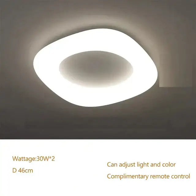 Minimalist frosted white cloud led pendant light with sleek oval design and soft diffused glow for home office decorbites cloud led