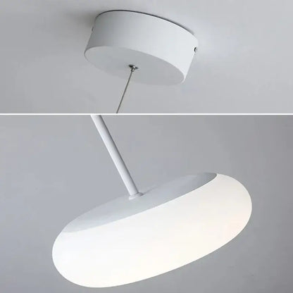 Minimalist frosted white glass pendant lamp with disc-shaped diffuser and cylindrical mount for dining table decorbites itka pendant lamp