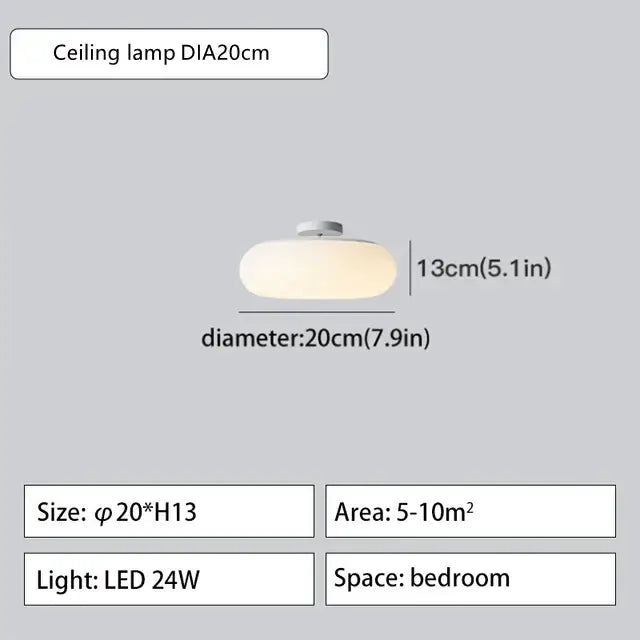 Minimalist frosted white glass pendant lamp with metallic base designed for bedroom lighting decorbites itka pendant lamp