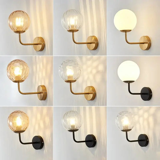 Minimalist gold and black metal wall lamp with decorbites glass ball led shades in clear textured and frosted finishes