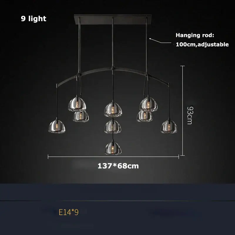 Modern black metal chandelier with nine clear glass globes for dining room featuring decorbites k9 crystal lighting