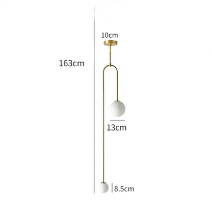 Minimalist gold double head glass pendant lights with sleek metal frame and two white glass ball shades for bedroom