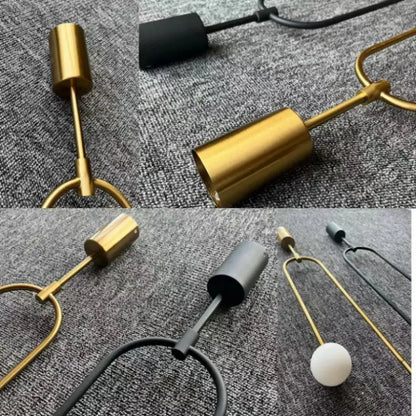 Minimalist gold double head glass pendant lights with cylindrical shade and sleek metal frame for bedroom use
