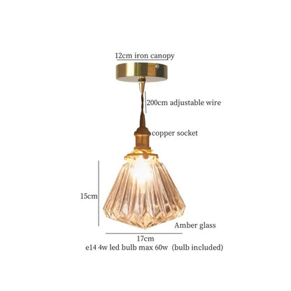 Minimalist gold faceted bubble glass led hanging light with amber glass shade brass canopy and copper socket for dining room