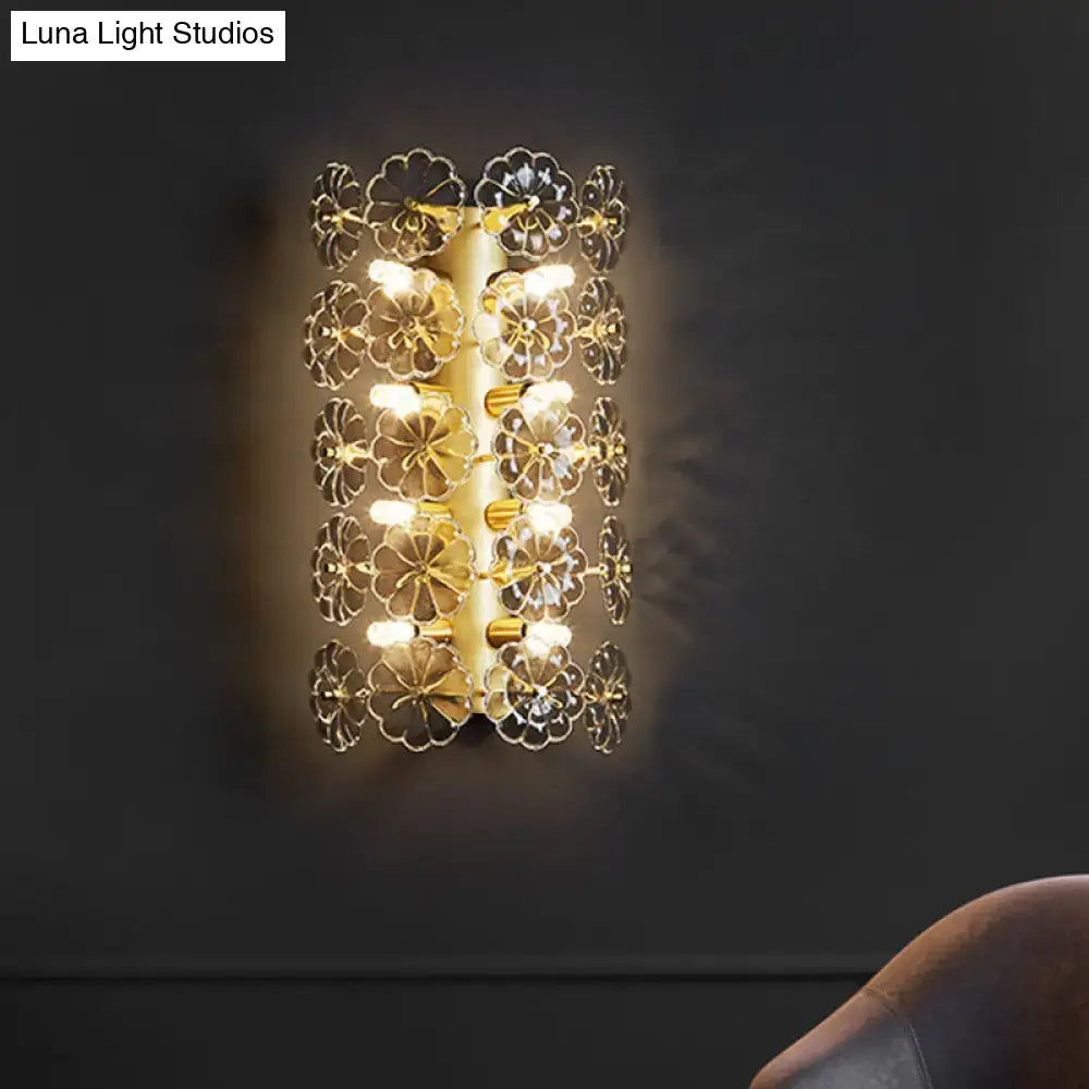 Minimalist gold floral crystal sconce light featuring intricate floral crystal accents for bedroom use