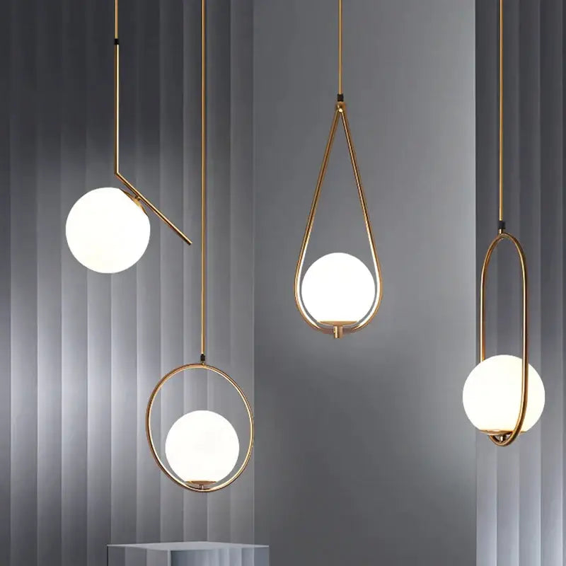 Minimalist gold glass ball led chandelier with frosted spherical shades and geometric metal frames for dining room decorbites glass ball