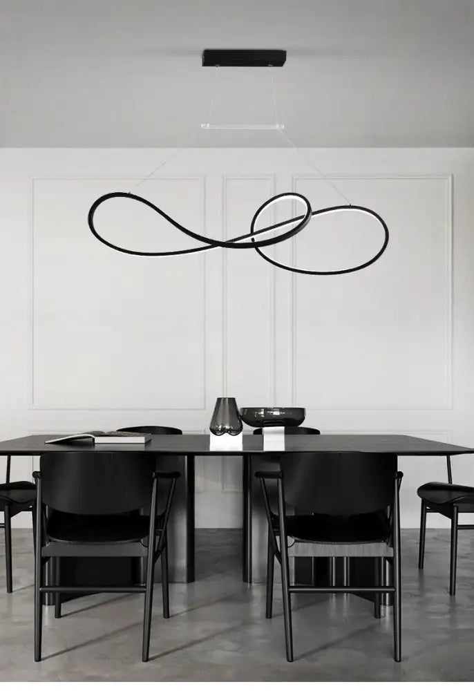Black minimalist metal dining pendant light with sleek intertwined loop design for led strip island dining room
