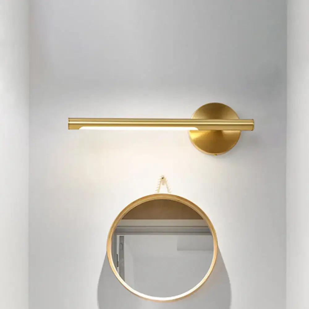 Gold-toned minimalist wall light with sleek horizontal bar and acrylic diffuser for bedroom sconce lighting