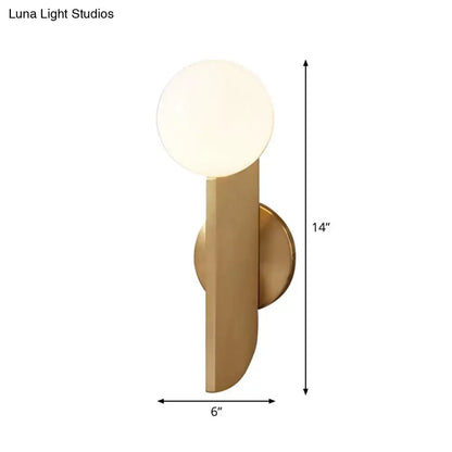 Minimalist gold mini globe wall sconce with frosted glass globe and sleek design for bedroom lighting