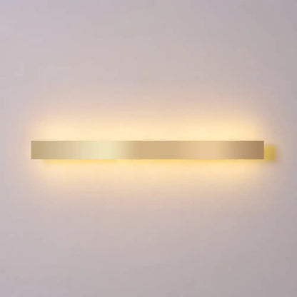 Modern minimalist gold plated led wall sconce with a sleek rectangular design for living room or bar lighting