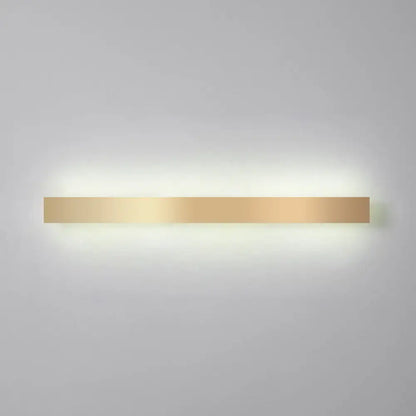 A sleek minimalist gold plated led wall sconce with a rectangular design for living room or bar lighting
