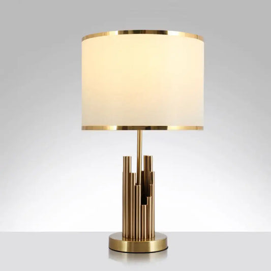 Decorbites minimalist table lamp with gold finish and cream fabric shade features vertical metal rods suitable for led incandescent lighting