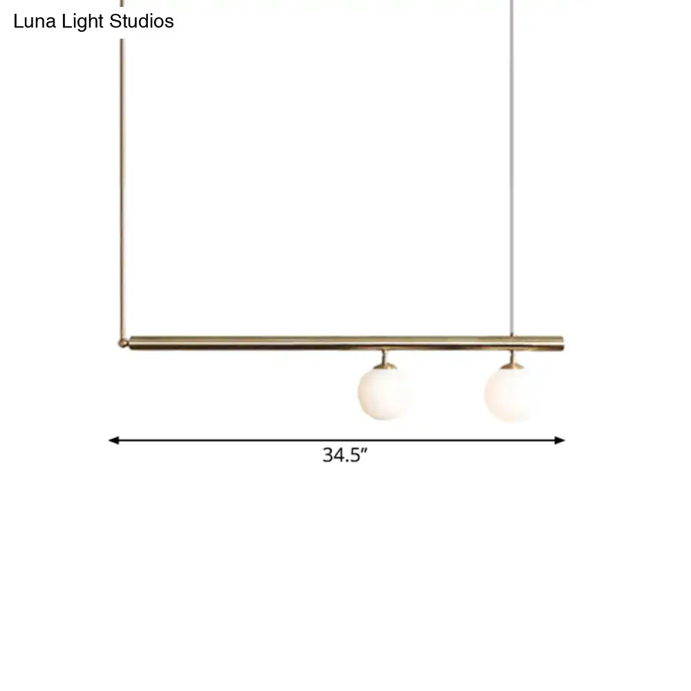DecorBites™ golden glass shade hanging lamp with brass bar and white glass globes for dining room lighting