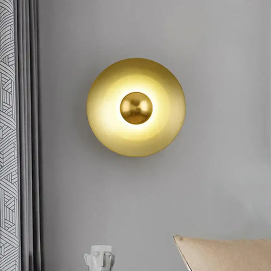 Minimalist golden macaroon led wall lamp with gold-toned spherical design providing warm ambient lighting for decorbites