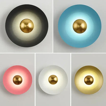 Modern minimalist golden macaroon led wall lamp with circular matte black blue pink white and gold sconces featuring central gold sphere