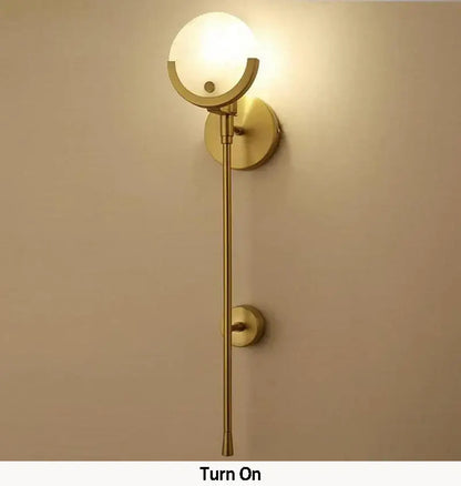Minimalist golden marble wall lamp with gold finished sconce and frosted glass globe for bedroom and living room decorbites golden marble wall