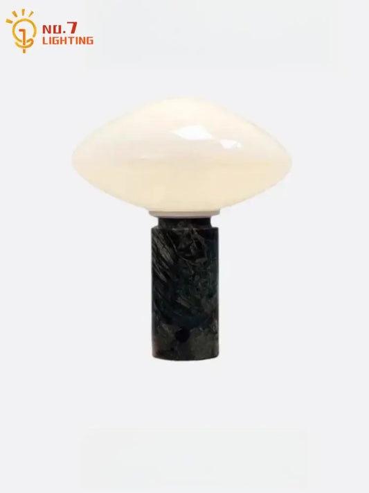 A sleek minimalist green marble led table lamp with frosted opal glass shade and decorbites green marble base