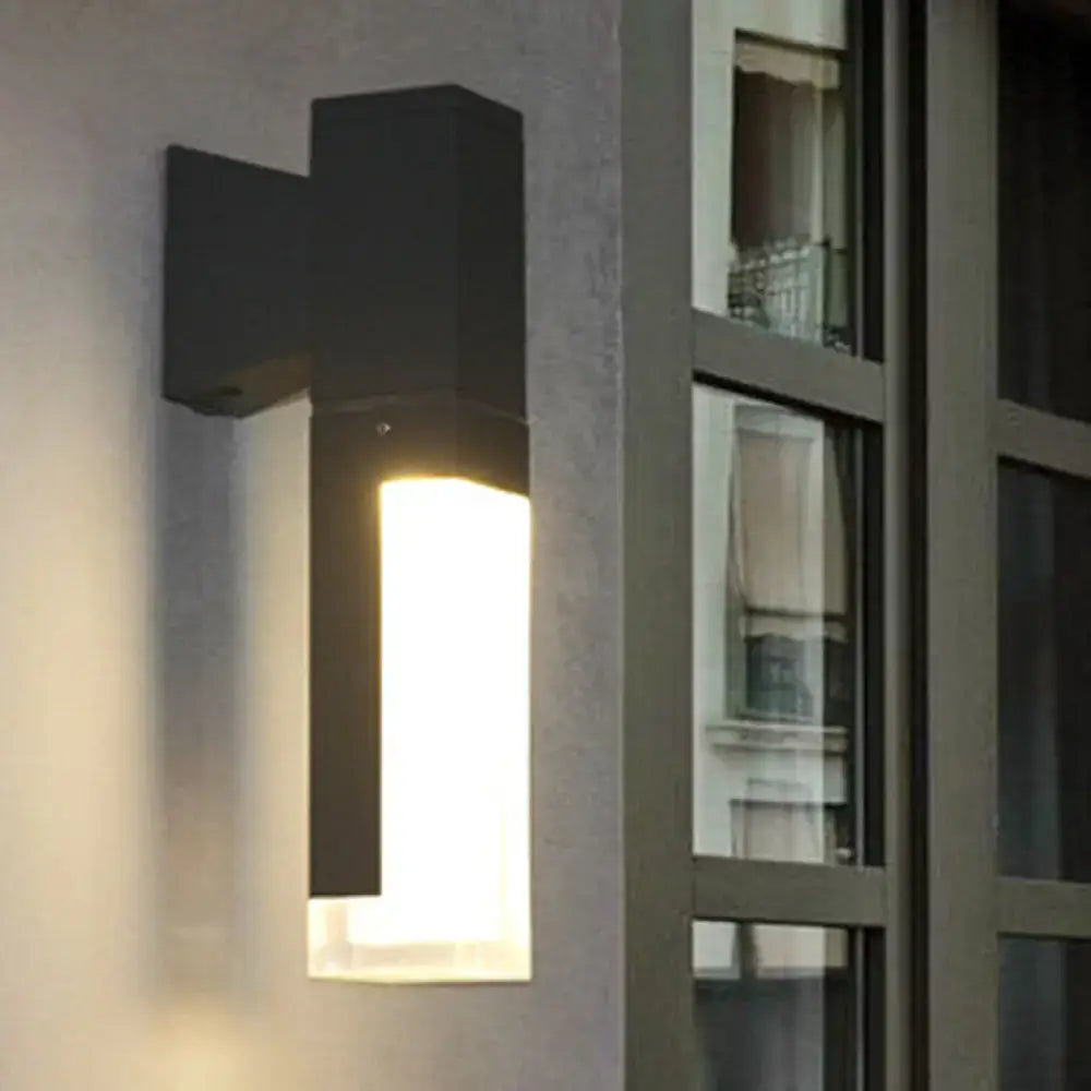 Black minimalist led wall lamp with rectangular design and warm white light for courtyard or indoor use