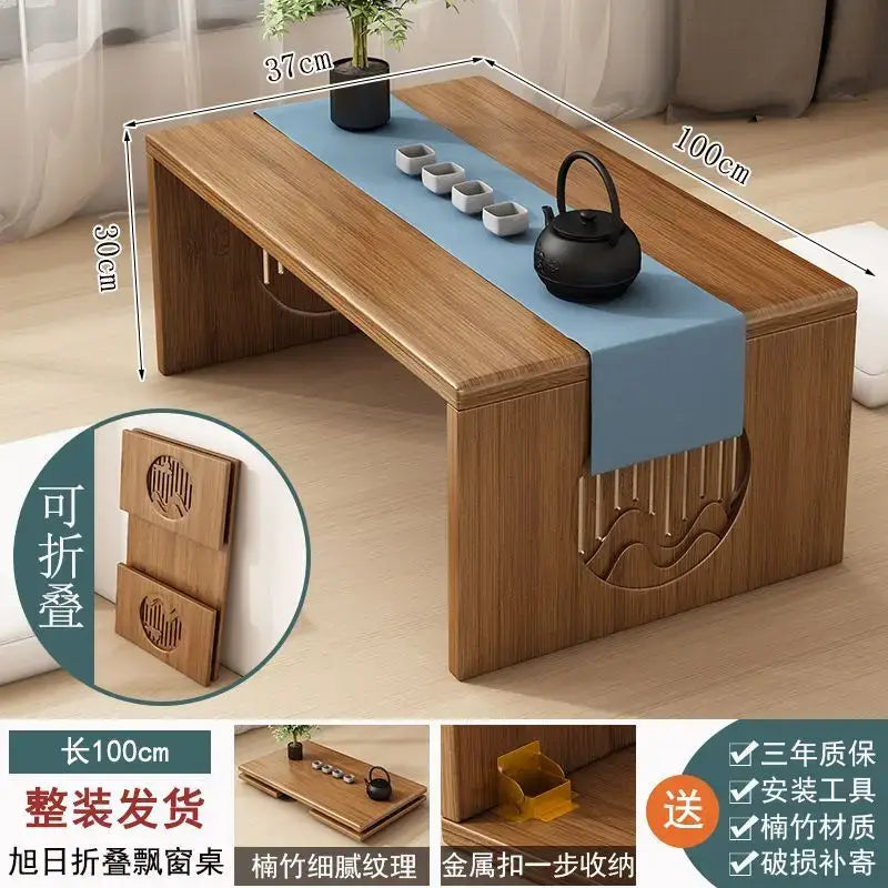 Minimalist light brown bamboo folding table with blue runner and carved wave patterns for bedroom tea use