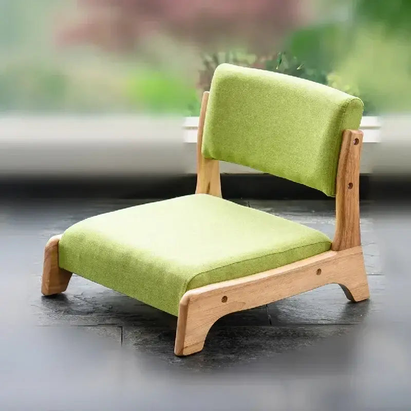 Minimalist green upholstered legless tatami chair with light wood frame for living room meditation by decorbites