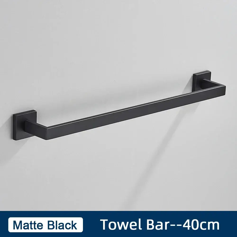 Matte black stainless steel towel bar with sleek modern design in minimalist bathroom accessories set
