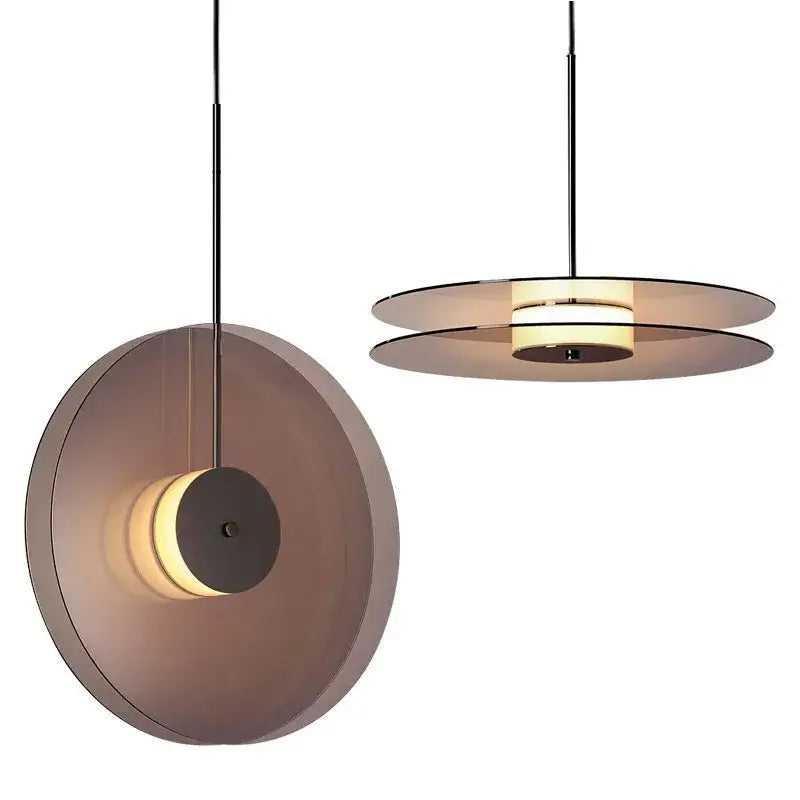 Minimalist matte glass pendant lights with translucent smoked glass shades and warm led illumination for dining rooms