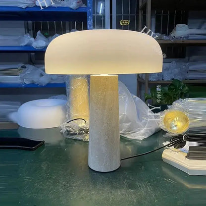 Minimalist mushroom cave stone table lamp with frosted glass shade and gray stone base for warm bedroom decorbites cave stone lighting