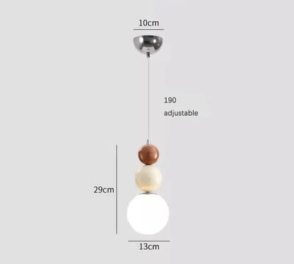 Minimalist nordic pendant light with three stacked terracotta, cream, and white bulbs and chrome ceiling mount for bedroom decorbites cream style