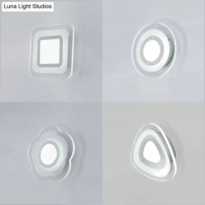 Minimalist off white wall lamp with triangle round square LED recessed ceiling lights in sleek silver finishes