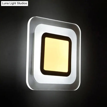 Minimalist off white square led wall lamp with sleek silver frame and warm yellow light in triangle round square design