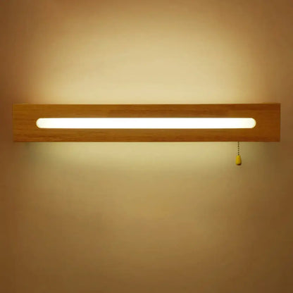 Minimalist rectangular wooden wall sconce with elongated led bulb included and yellow pull chain for bedroom lighting