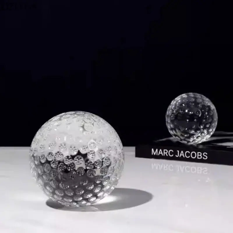 Clear glass crystal ball desk decoration with textured dimpled surface for minimalist bedroom decor