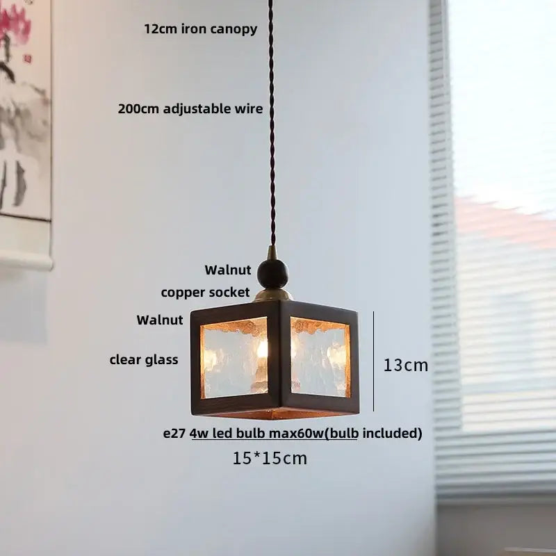 Minimalist walnut and brass glass led pendant lamp featuring a 13cm cube walnut iron frame with clear textured panels